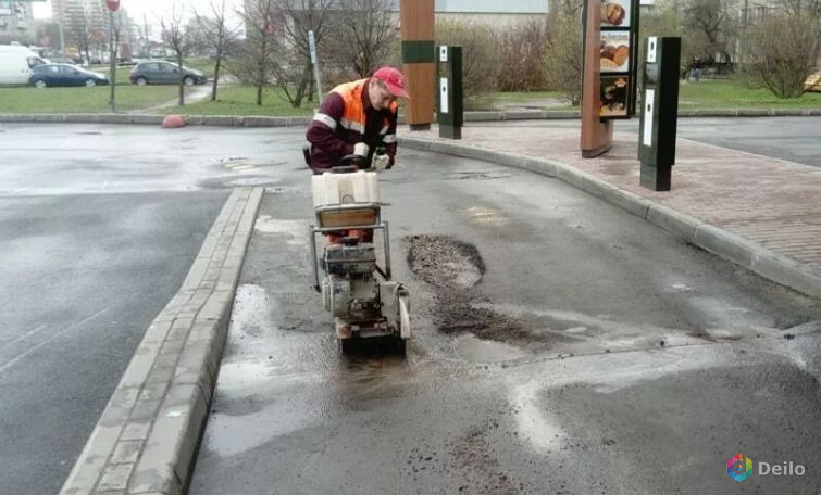 Заливка трещин на асфальте