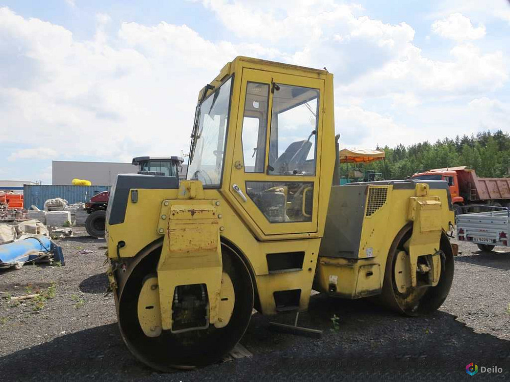 Асфальтовый тандемный каток Bomag 144 8, 5 т, разрезные валь